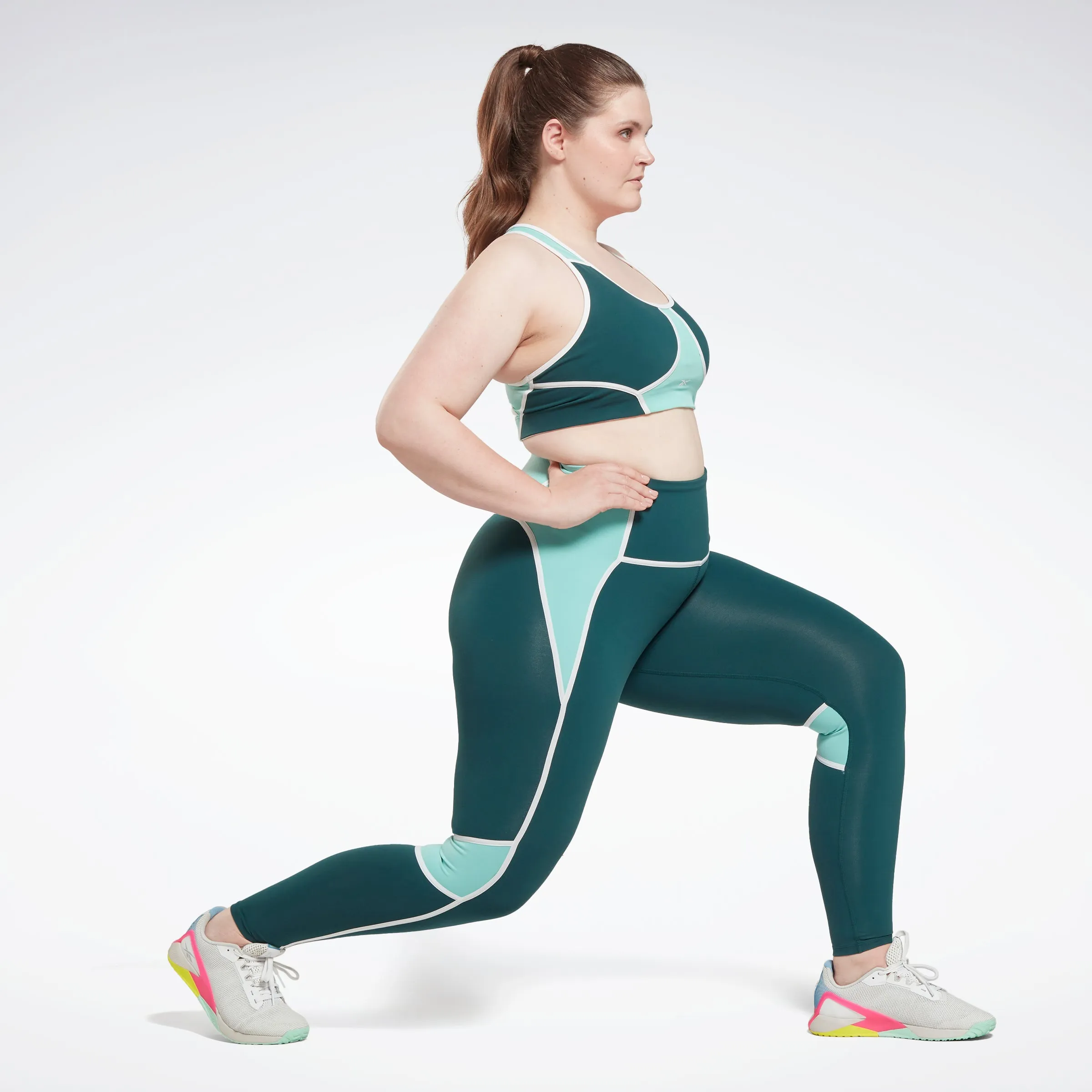 Reebok Apparel Women Lux High-Waisted Colorblock Leggings (Plus Size) Forgrn